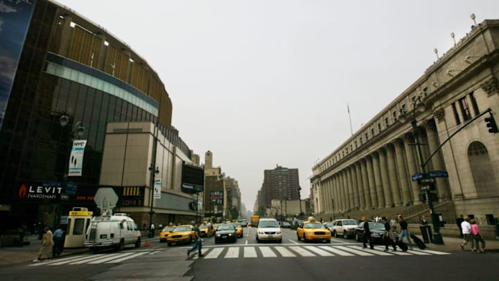 NEW YORK - MAY 21: Madison Square Garden (L) and the Farley Post Office sit on the opposite sides of Eighth Avenue, May 21, 2004 in New York City. The sites will be connected by a planned bridge across Eighth Ave. for the GOP convention. (Photo by Chris Hondros/Getty Images)