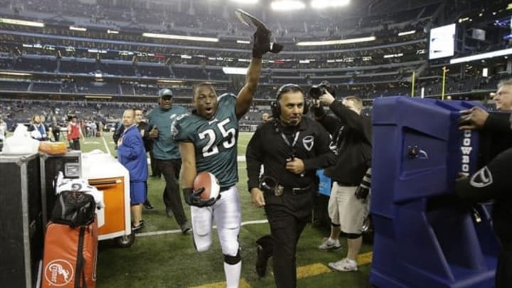 Dec 29, 2013; Arlington, TX, USA; Philadelphia Eagles running back LeSean McCoy (25) celebrates while he leaves the field after the game against the Dallas Cowboys at AT