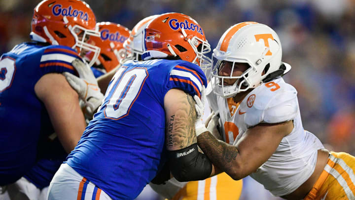 Florida offensive lineman Michael Tarquin (70) defends against Tennessee linebacker Tyler Baron (9) during a game at Ben Hill Griffin Stadium in Gainesville, Fla. on Saturday, Sept. 25, 2021.Kns Tennessee Florida Football
