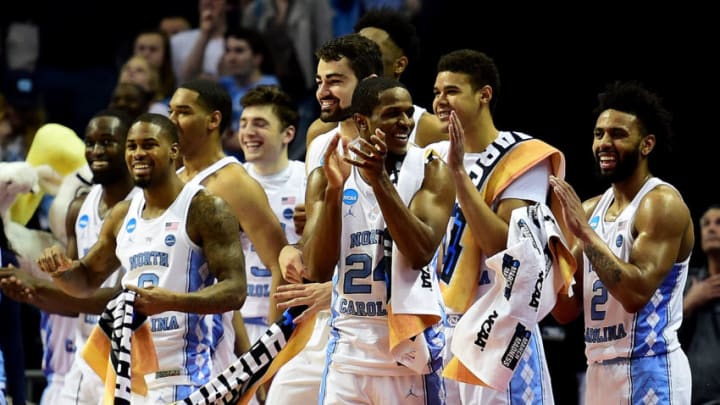 CHARLOTTE, NC - MARCH 16: The North Carolina Tar Heels react after defeating the Lipscomb Bisons 84-66 during the first round of the 2018 NCAA Men's Basketball Tournament at Spectrum Center on March 16, 2018 in Charlotte, North Carolina. (Photo by Jared C. Tilton/Getty Images)