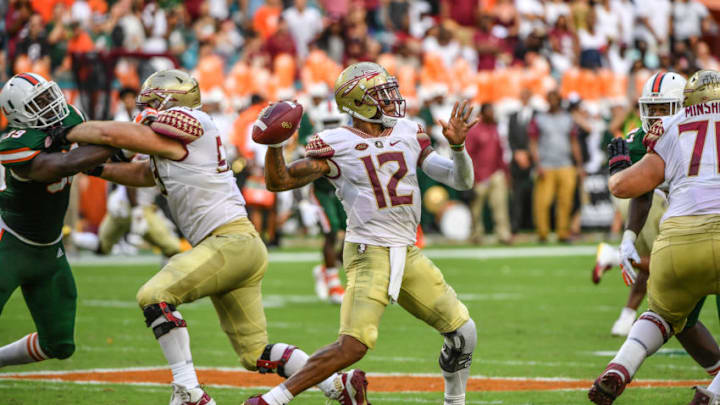 MIAMI, FL - OCTOBER 06: Deondre Francois #12 of the Florida State Seminoles throws a pass in the first half against the Miami Hurricanes at Hard Rock Stadium on October 6, 2018 in Miami, Florida. (Photo by Mark Brown/Getty Images)