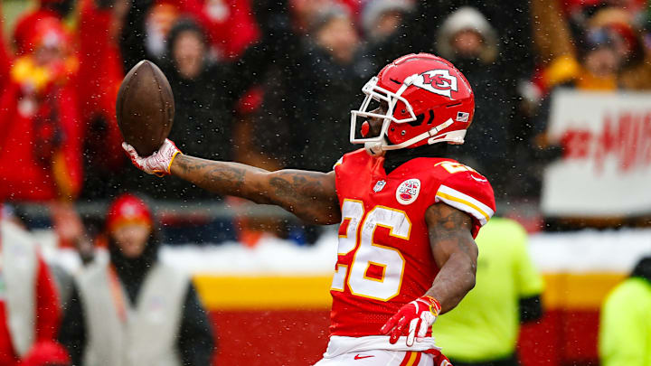 KANSAS CITY, MO – JANUARY 12: Damien Williams #26 of the Kansas City Chiefs presents the ball to the crowd after scoring the game’s first touchdown during the first quarter of the game against the Indianapolis Colts during the AFC Divisional Round playoff game at Arrowhead Stadium on January 12, 2019 in Kansas City, Missouri. (Photo by David Eulitt/Getty Images)