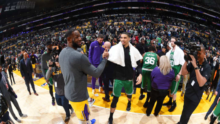 LOS ANGELES, CA - MARCH 9: LeBron James #23 of the Los Angeles Lakers and Jayson Tatum #0 of the Boston Celtics high-five after a game on March 9, 2019 at STAPLES Center in Los Angeles, California. NOTE TO USER: User expressly acknowledges and agrees that, by downloading and/or using this Photograph, user is consenting to the terms and conditions of the Getty Images License Agreement. Mandatory Copyright Notice: Copyright 2019 NBAE (Photo by Andrew D. Bernstein/NBAE via Getty Images)