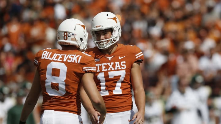AUSTIN, TX – OCTOBER 13: Ryan Bujcevski #8 of the Texas Longhorns congratulates Cameron Dicker #17 after a field goal in the first half against the Baylor Bears at Darrell K Royal-Texas Memorial Stadium on October 13, 2018 in Austin, Texas. (Photo by Tim Warner/Getty Images)