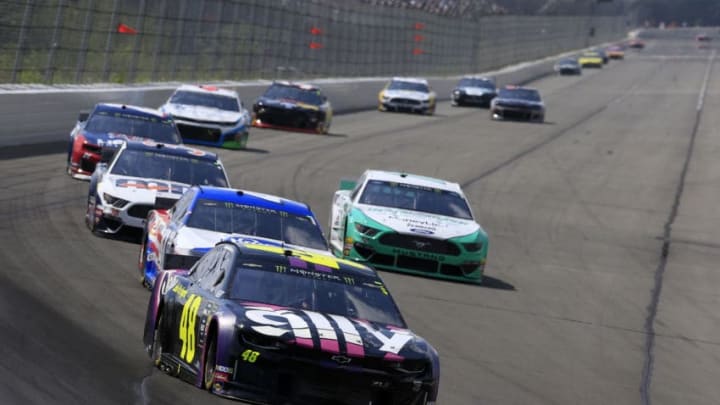 LONG POND, PENNSYLVANIA - JULY 28: Jimmie Johnson, driver of the #48 Ally Chevrolet, leads a pack of cars during the Monster Energy NASCAR Cup Series Gander RV 400 at Pocono Raceway on July 28, 2019 in Long Pond, Pennsylvania. (Photo by Chris Trotman/Getty Images)