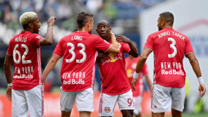 SEATTLE, WASHINGTON – SEPTEMBER 15: Aaron Long #33, Michael Murillo #62, Bradley Wright-Phillips #99, and Amro Tarek #3 of New York Red Bulls celebrate after scoring a goal in the 27th minute during the match against the Seattle Sounders at CenturyLink Field on September 15, 2019 in Seattle, Washington. The Seattle Sounders top the New York Red Bulls 4-2. (Photo by Alika Jenner/Getty Images)