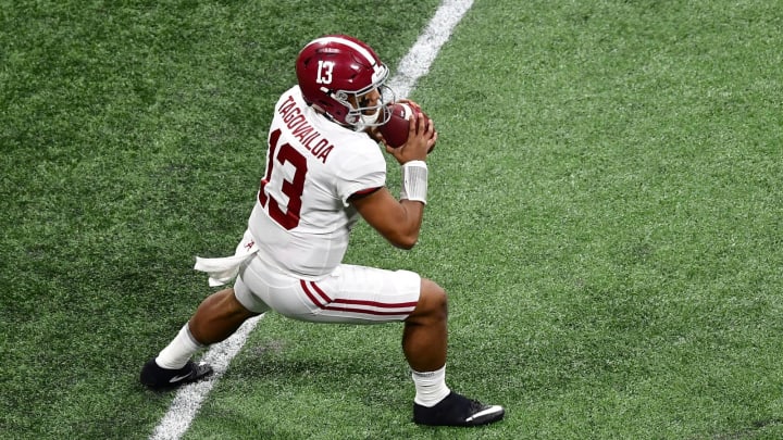 ATLANTA, GA – JANUARY 08: Tua Tagovailoa #13 of the Alabama Crimson Tide passes against the Georgia Bulldogs in the CFP National Championship presented by AT&T at Mercedes-Benz Stadium on January 8, 2018 in Atlanta, Georgia. (Photo by Scott Cunningham/Getty Images)