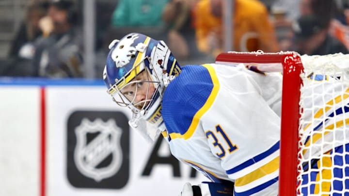 EDMONTON, CANADA OCTOBER 18: Eric Comrie #31 of the Buffalo Sabres looks on during a game against the Edmonton Oilers on October 18, 2022 at Rogers Place in Edmonton, Alberta, Canada. (Photo by Lawrence Scott/Getty Images)