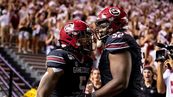 COLUMBIA, SC – SEPTEMBER 28: Rico Dowdle #5 celebrates with Jaylen Nichols #52 of the South Carolina Gamecocks after scoring a touchdown during the second half of a game against the Kentucky Wildcats at Williams-Brice Stadium on September 28, 2019 in Columbia, South Carolina. (Photo by Carmen Mandato/Getty Images)