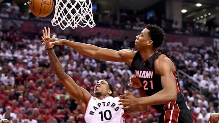 May 3, 2016; Toronto, Ontario, CAN; Toronto Raptors guard DeMar DeRozan (10) has a shot blocked by Miami Heat center Hassan Whiteside (21) in game one of the second round of the NBA Playoffs at Air Canada Centre. The Heat won 102-96. Mandatory Credit: Dan Hamilton-USA TODAY Sports
