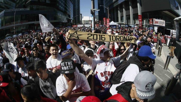 Apr 16, 2016; Toronto, Ontario, CAN; Toronto Raptors fans in the area know as Jurassic Park outside of the Air Canada Centre prior to game one of the first round of the 2016 NBA Playoffs between the Indiana Pacers and Toronto Raptors. Mandatory Credit: John E. Sokolowski-USA TODAY Sports