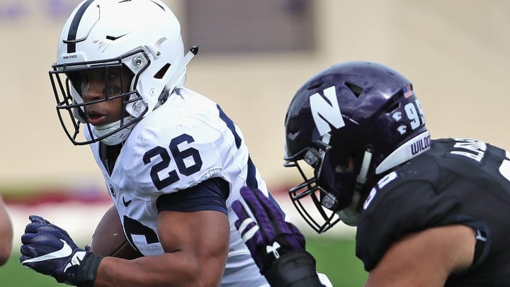 EVANSTON, IL – OCTOBER 07: Saquon Barkley #26 of the Penn State Nittany Lions is chased by Alex Miller #95 of the Northwestern Wildcats at Ryan Field on October 7, 2017 in Evanston, Illinois. (Photo by Jonathan Daniel/Getty Images)