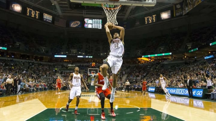 Dec 13, 2014; Milwaukee, WI, USA; Milwaukee Bucks forward Jabari Parker (12) drives for a dunk during the second quarter against the Los Angeles Clippers at BMO Harris Bradley Center. Mandatory Credit: Jeff Hanisch-USA TODAY Sports