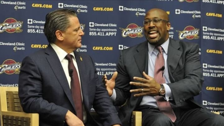 Apr 24, 2013; Independence, OH, USA; New Cleveland Cavaliers head coach Mike Brown (right) talks beside team owner Dan Gilbert during a press conference at Cleveland Clinic Courts. Mandatory Credit: David Richard-USA TODAY Sports