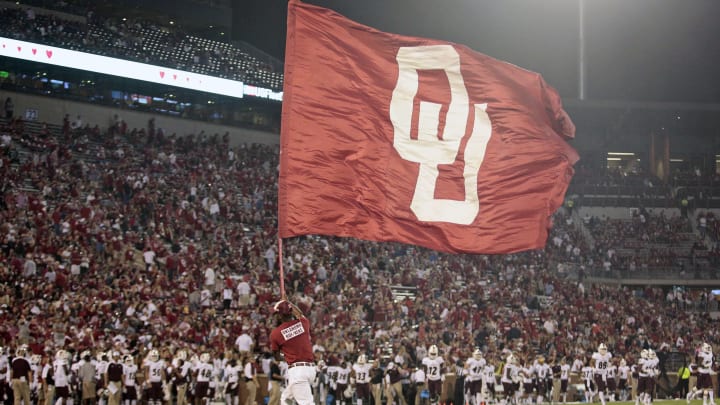 NORMAN, OK – SEPTEMBER 10 : An Oklahoma Sooners RUF/NEK waves a flag after a touchdown against the Louisiana Monroe Warhawks September 10, 2016 at Gaylord Family Memorial Stadium in Norman, Oklahoma. The Sooners defeated the Warhawks 59-17. (Photo by Brett Deering/Getty Images) *** local caption ***