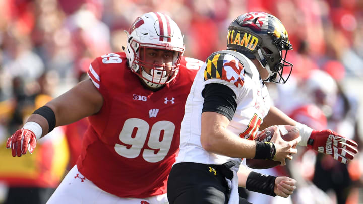 MADISON, WI – OCTOBER 21: Olive Sagapolu #99 of the Wisconsin Badgers pressures Max Bortenschlager #18 of the Maryland Terrapins during the second half at Camp Randall Stadium on October 21, 2017 in Madison, Wisconsin. (Photo by Stacy Revere/Getty Images)
