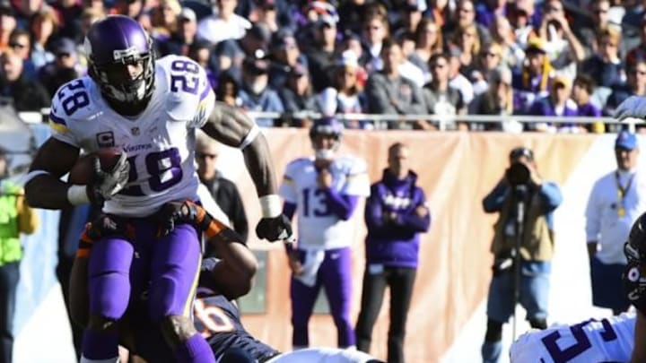 Nov 1, 2015; Chicago, IL, USA; Minnesota Vikings running back Adrian Peterson (28) carries the ball against the Chicago Bears during the second half at Soldier Field. Mandatory Credit: Mike DiNovo-USA TODAY Sports
