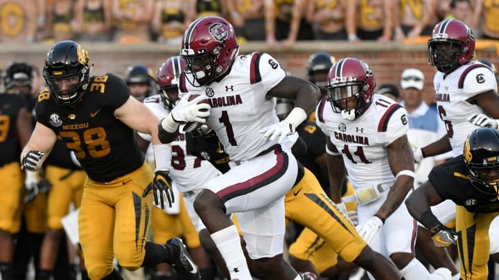 Deebo Samuel #1 of the South Carolina Gamecocks returns a kick for a 97-yard touchdown against Mizzou football (Photo by Ed Zurga/Getty Images)