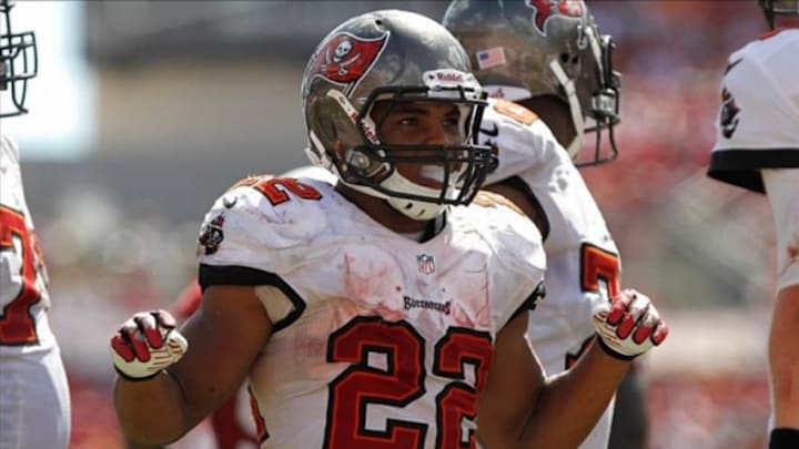 Sep 29, 2013; Tampa, FL, USA; Tampa Bay Buccaneers running back Doug Martin (22) against the Arizona Cardinals during the second half at Raymond James Stadium. Arizona Cardinals defeated the Tampa Bay Buccaneers 13-10. Mandatory Credit: Kim Klement-USA TODAY Sports