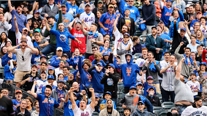 Jun 18, 2022; New York City, New York, USA; New York Mets fans celebrate after Miami Marlins second baseman Jazz Chisholm Jr. (not pictured) is ejected from the game during the ninth inning at Citi Field. Mandatory Credit: Jessica Alcheh-USA TODAY Sports