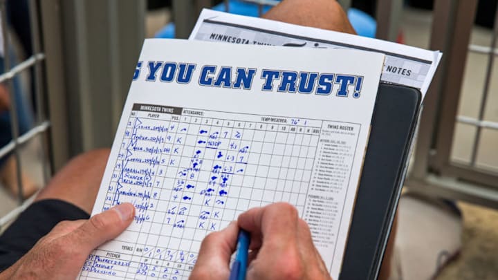 MINNEAPOLIS, MN - MAY 03: A Minnesota Twins keeps the book with a pen on his scorecard against the Chicago White Sox on May 3, 2015 at Target Field in Minneapolis, Minnesota. The Twins defeated the White Sox 13-3. (Photo by Brace Hemmelgarn/Minnesota Twins/Getty Images)
