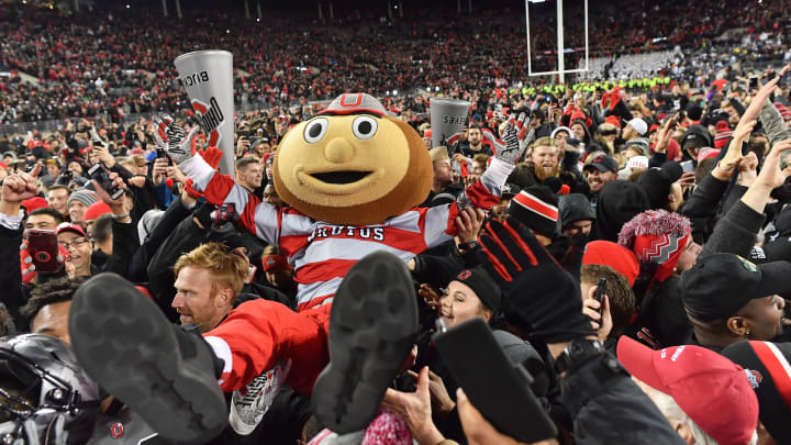 COLUMBUS, OH – OCTOBER 28: Ohio State Buckeyes mascot Brutus Buckeye celebrates with fans at Ohio Stadium on October 28, 2017 in Columbus, Ohio. Ohio State defeated Penn Statte 39-38. (Photo by Jamie Sabau/Getty Images)