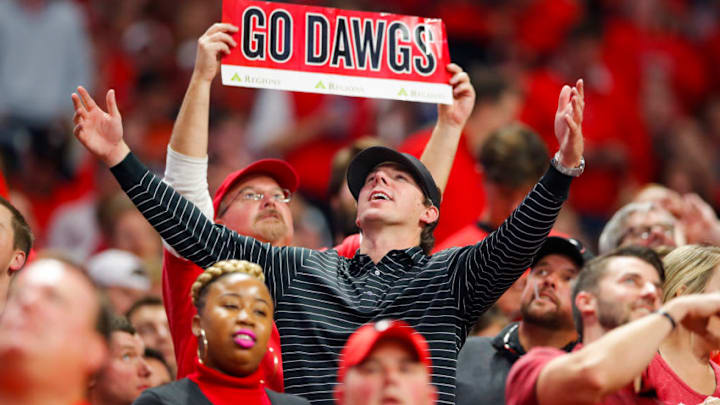 ATLANTA, GA - DECEMBER 02: Georgia Bulldogs fans cheer on the team during the SEC Championship Game between the Georgia Bulldogs and the Auburn Tigers on December 02, 2017 at Mercedes-Benz Stadium in Atlanta, GA. The Georgia Bulldogs won the game 28-7. (Photo by Todd Kirkland/Icon Sportswire via Getty Images)