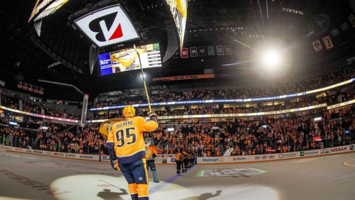 NASHVILLE, TN - OCTOBER 3: Matt Duchene #95 of the Nashville Predators raises his stick to the fans after a 5-2 win against the Minnesota Wild at Bridgestone Arena on October 3, 2019 in Nashville, Tennessee. (Photo by John Russell/NHLI via Getty Images)