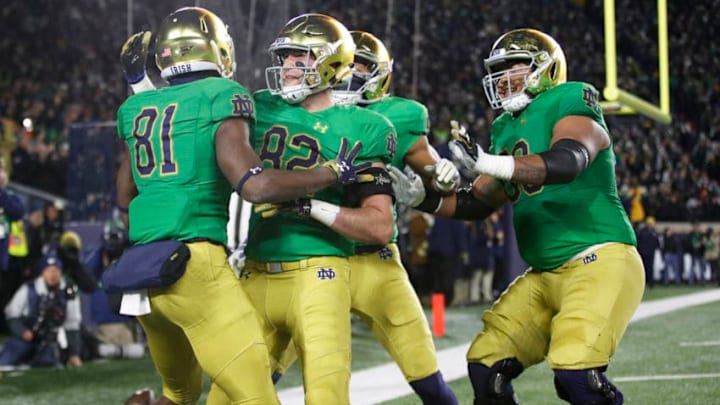 SOUTH BEND, IN - NOVEMBER 10: Miles Boykin #81 of the Notre Dame Fighting Irish celebrates with teammates after a three-yard touchdown reception against the Florida State Seminoles in the first quarter of the game at Notre Dame Stadium on November 10, 2018 in South Bend, Indiana. (Photo by Joe Robbins/Getty Images)