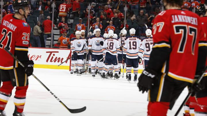 CALGARY, AB - DECEMBER 2: The Edmonton Oilers celebrate after a win against the Calgary Flames at Scotiabank Saddledome on December 2, 2017 in Calgary, Alberta, Canada. (Photo by Gerry Thomas/NHLI via Getty Images)