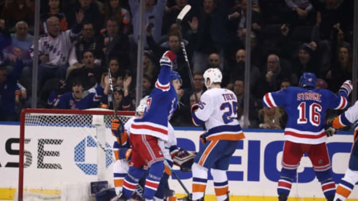 NEW YORK, NEW YORK – JANUARY 10: Jesper Fast #17 of the New York Rangers celebrates his third period goal against Robin Lehner #40 of the New York Islanders during their game at Madison Square Garden on January 10, 2019 in New York City. (Photo by Al Bello/Getty Images)