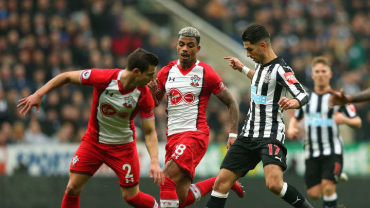 NEWCASTLE UPON TYNE, ENGLAND - MARCH 10: Ayoze Perez of Newcastle United is challenged by Cedric Soares and Mario Lemina of Southampton during the Premier League match between Newcastle United and Southampton at St. James Park on March 10, 2018 in Newcastle upon Tyne, England. (Photo by Alex Livesey/Getty Images)