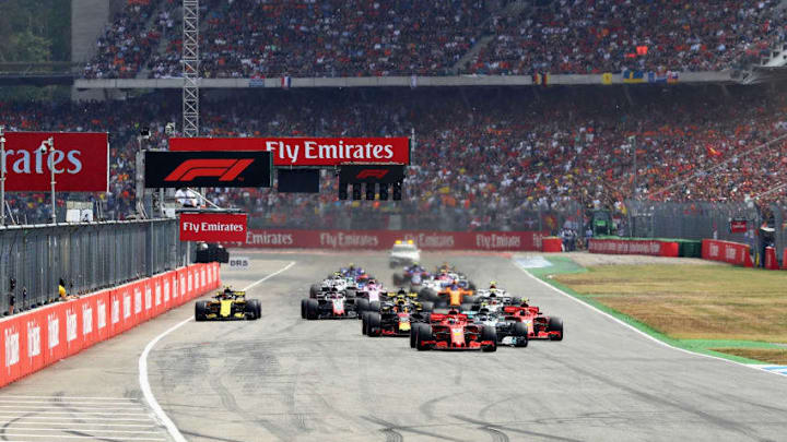 HOCKENHEIM, GERMANY - JULY 22: Sebastian Vettel of Germany driving the (5) Scuderia Ferrari SF71H leads the field at the start during the Formula One Grand Prix of Germany at Hockenheimring on July 22, 2018 in Hockenheim, Germany. (Photo by Mark Thompson/Getty Images)