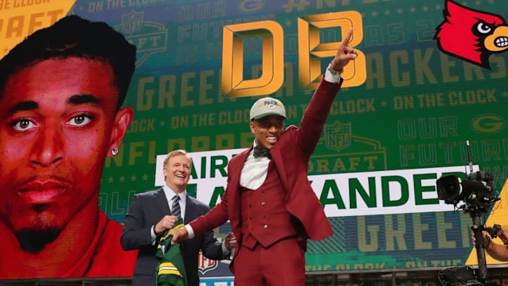 ARLINGTON, TX - APRIL 26: Jaire Alexander of Louisville reacts with NFL Commissioner Roger Goodell after being picked