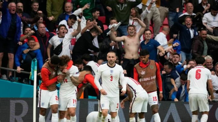 England's players celebrate their second goal scored by forward Harry Kane during the UEFA EURO 2020 round of 16 football match between England and Germany at Wembley Stadium in London on June 29, 2021. (Photo by Frank Augstein / POOL / AFP) (Photo by FRANK AUGSTEIN/POOL/AFP via Getty Images)