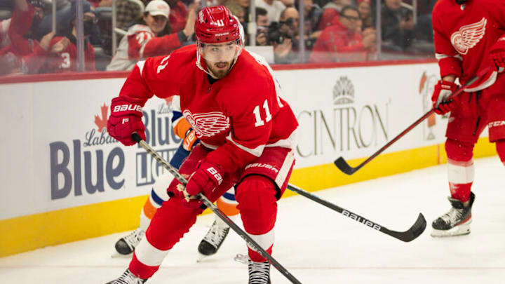 Dec 14, 2021; Detroit, Michigan, USA; Detroit Red Wings right wing Filip Zadina (11) skates with the puck during the first period against the New York Islanders at Little Caesars Arena. Mandatory Credit: Raj Mehta-USA TODAY Sports