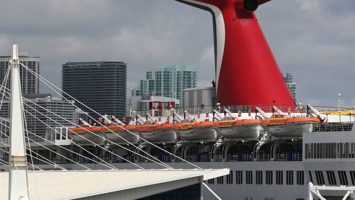 MIAMI, FLORIDA – APRIL 18: The Carnival Sensation cruise ship is seen at PortMiami on April 18, 2019 in Miami, Florida. Reports indicate that Carnival Corporation repeatedly broke environmental laws even during its first year of being on probation after being convicted of systematically violating environmental laws. (Photo by Joe Raedle/Getty Images)