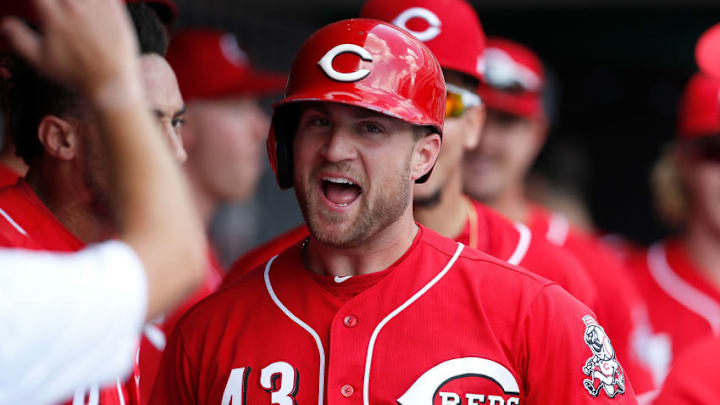 FanDuel MLB: CINCINNATI, OH - JUNE 24: Scott Schebler #43 of the Cincinnati Reds is congratulated by his teammates after scoring the go-ahead run during the seventh inning of the game against the Chicago Cubs at Great American Ball Park on June 24, 2018 in Cincinnati, Ohio. Cincinnati defeated Chicago 8-6. (Photo by Kirk Irwin/Getty Images)