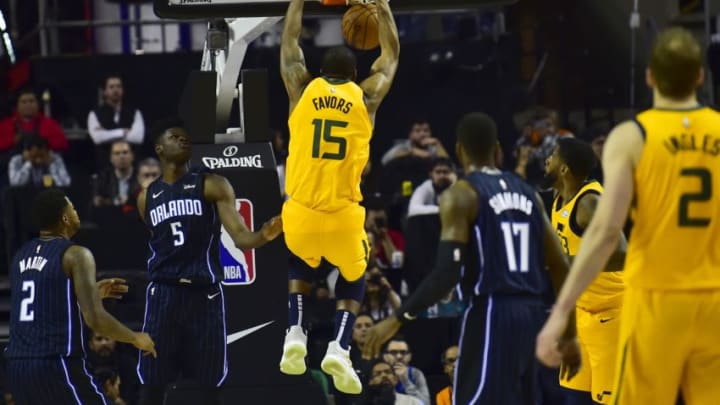 Utah Jazz's Derrick Favors scores a basket, during their NBA Global Games match against the Orlando Magic at the Mexico City Arena, on December 15, 2018, in Mexico City. (Photo by PEDRO PARDO / AFP) (Photo credit should read PEDRO PARDO/AFP/Getty Images)