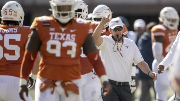 Nov 7, 2020; Austin, Texas, USA; Texas head coach Tom Herman leads his team during warmups before the game against West Virginia at Royal-Memorial Stadium on Saturday November 7, 2020. Mandatory Credit: Jay Janner-USA TODAY NETWORK Nov 7, 2020; Austin, Texas, USA; Texas head coach Tom Herman leads his team during warmups before the game against West Virginia at Royal-Memorial Stadium on Saturday November 7, 2020. Mandatory Credit: Jay Janner-USA TODAY NETWORK