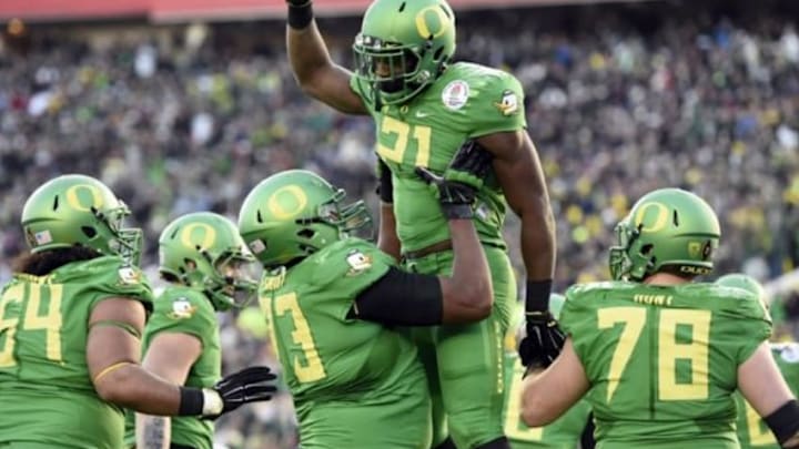 Jan 1, 2015; Pasadena, CA, USA; Oregon Ducks running back Royce Freeman (21) celebrates making a touchdown with teammates during the second half against the Florida State Seminoles in the 2015 Rose Bowl college football game at Rose Bowl. Mandatory Credit: Gary Vasquez-USA TODAY Sports
