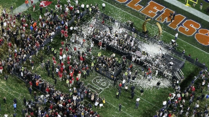 Jan 11, 2016; Glendale, AZ, USA; Alabama Crimson Tide celebrate their 45-40 victory over the Clemson Tigers in the 2016 CFP National Championship at University of Phoenix Stadium. Mandatory Credit: Erich Schlegel-USA TODAY Sports