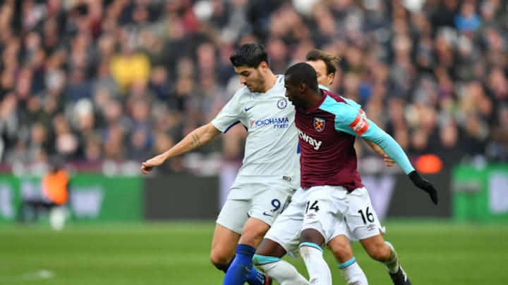 LONDON, ENGLAND - DECEMBER 09: Alvaro Morata of Chelsea is challenged by Mark Noble of West Ham United and Pedro Obiang of West Ham United during the Premier League match between West Ham United and Chelsea at London Stadium on December 9, 2017 in London, England. (Photo by Dan Mullan/Getty Images)