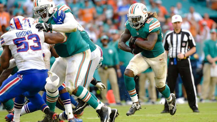 Oct 23, 2016; Miami Gardens, FL, USA; Miami Dolphins running back Jay Ajayi (23) carries the ball during the second half against the Buffalo Bills at Hard Rock Stadium. The Dolphins won 28-25. Mandatory Credit: Steve Mitchell-USA TODAY Sports