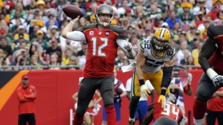 Dec 21, 2014; Tampa, FL, USA; Tampa Bay Buccaneers quarterback Josh McCown (12) drops back to pass against the Green Bay Packers as the Green Bay Packers beat the Tampa Bay Buccaneers 20-3 at Raymond James Stadium. Credit: David Manning-USA TODAY Sports