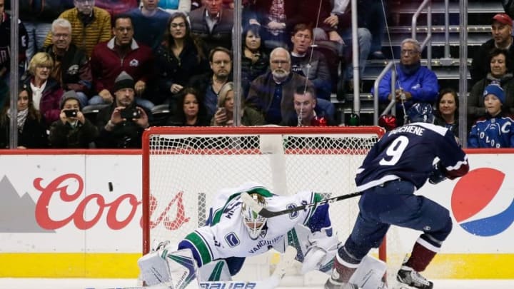 Nov 26, 2016; Denver, CO, USA; Vancouver Canucks goalie Jacob Markstrom (25) makes a save against Colorado Avalanche center Matt Duchene (9) in the overtime shootout at the Pepsi Center. The Canucks won 3-2 in a shootout. Mandatory Credit: Isaiah J. Downing-USA TODAY Sports