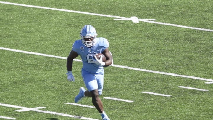 Oct 24, 2020; Chapel Hill, North Carolina, USA; North Carolina Tar Heels running back Michael Carter (8) with the ball in the first quarter at Kenan Memorial Stadium. Mandatory Credit: Bob Donnan-USA TODAY Sports
