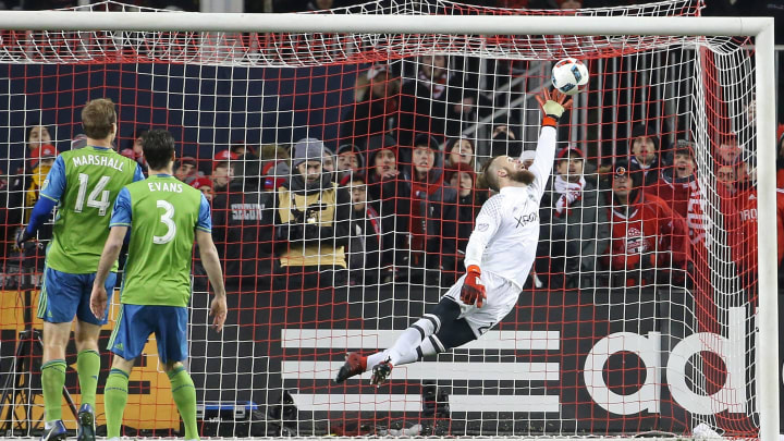 Dec 10, 2016; Toronto, Canada; Seattle Sounders goalkeeper Stefan Frei (24) leaps to make a save on a header from Toronto FC forward Jozy Altidore (not pictured) during extra time in the 2016 MLS Cup at BMO Field. Mandatory Credit: Geoff Burke-USA TODAY Sports