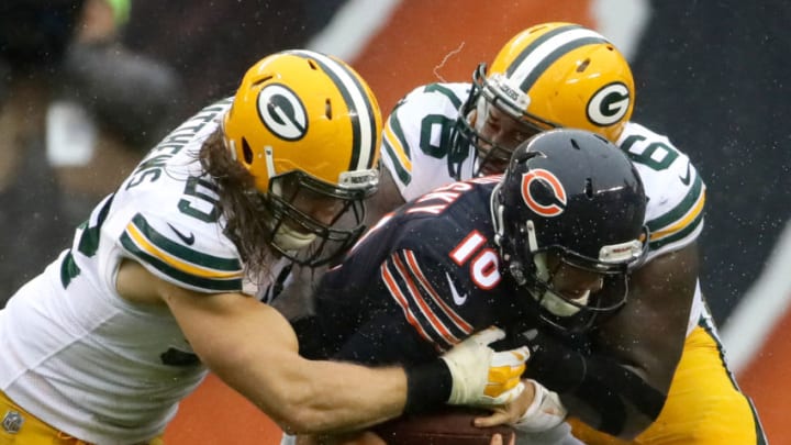 CHICAGO, IL - NOVEMBER 12: Quarterback Mitchell Trubisky #10 of the Chicago Bears is tackled by Mike Daniels #76 of the Green Bay Packers in the second quarter at Soldier Field on November 12, 2017 in Chicago, Illinois. (Photo by Jonathan Daniel/Getty Images)