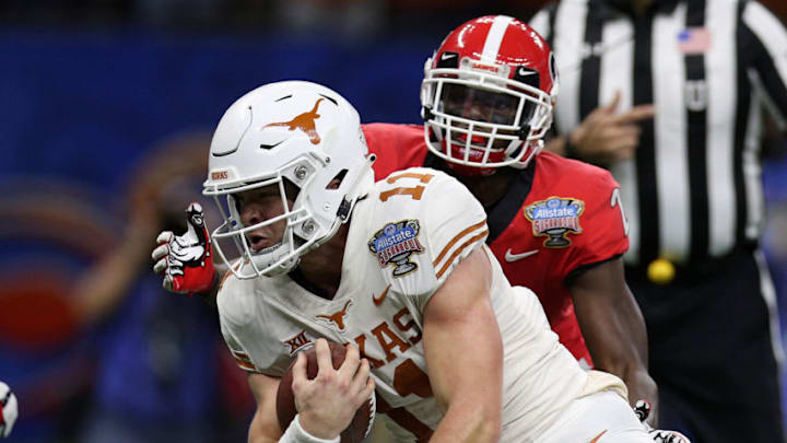 NEW ORLEANS, LOUISIANA - JANUARY 01: Sam Ehlinger #11 of the Texas Longhorns scores a touchdown against the Georgia Bulldogs during the Allstate Sugar Bowl at Mercedes-Benz Superdome on January 01, 2019 in New Orleans, Louisiana. (Photo by Chris Graythen/Getty Images) NEW ORLEANS, LOUISIANA - JANUARY 01: Sam Ehlinger #11 of the Texas Longhorns scores a touchdown against the Georgia Bulldogs during the Allstate Sugar Bowl at Mercedes-Benz Superdome on January 01, 2019 in New Orleans, Louisiana. (Photo by Chris Graythen/Getty Images)